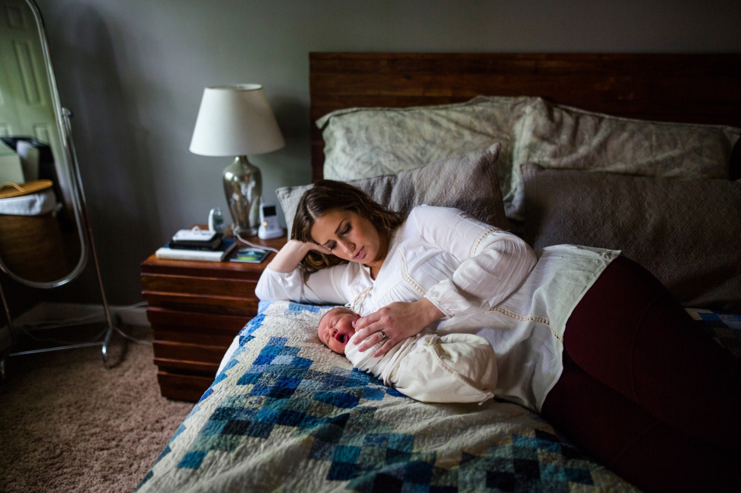A mother holding her newborn